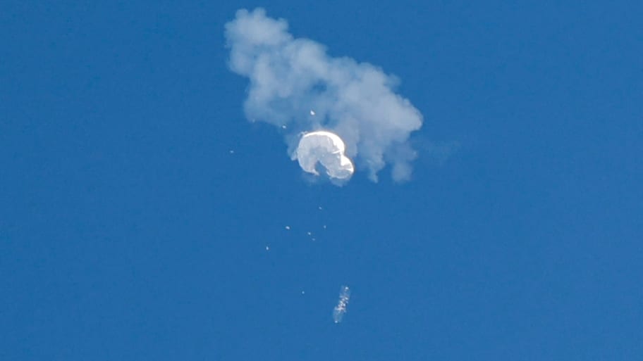 The suspected Chinese spy balloon drifts to the ocean after being shot down off the coast in Surfside Beach, South Carolina, U.S. February 4, 2023. 