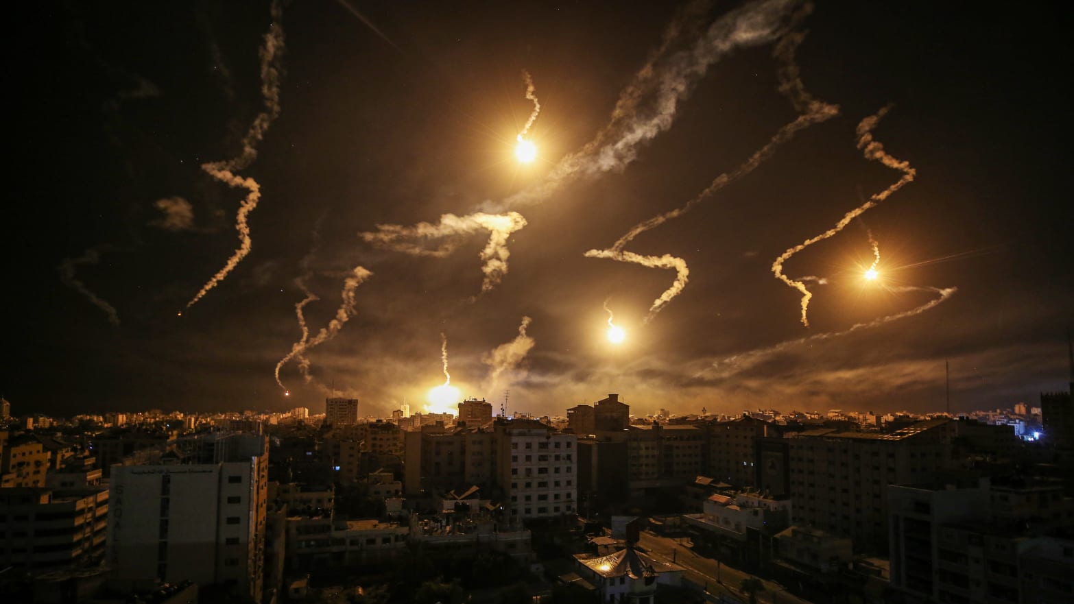 Flares rising up over Gaza Strip.