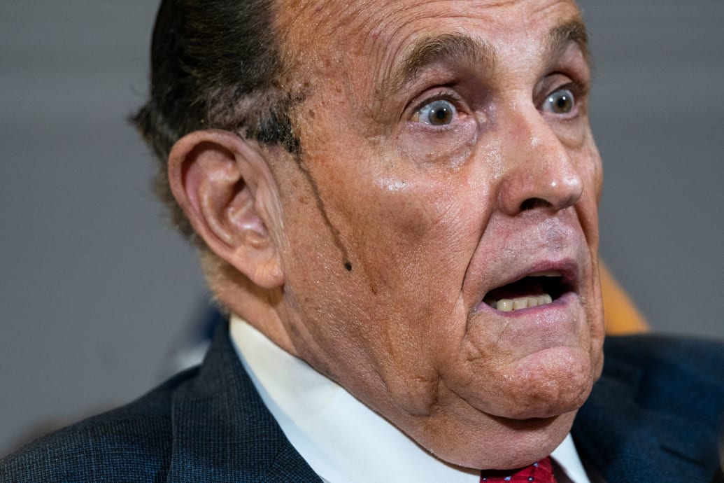 Rudy Giuliani with hair dye dripping down his face