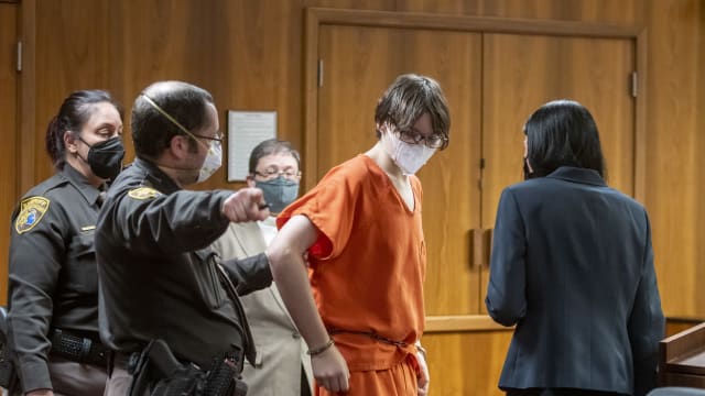 Ethan Crumbley is led away from the courtroom after a placement hearing at Oakland County Circuit Court on February 22, 2022 in Pontiac, Michigan.