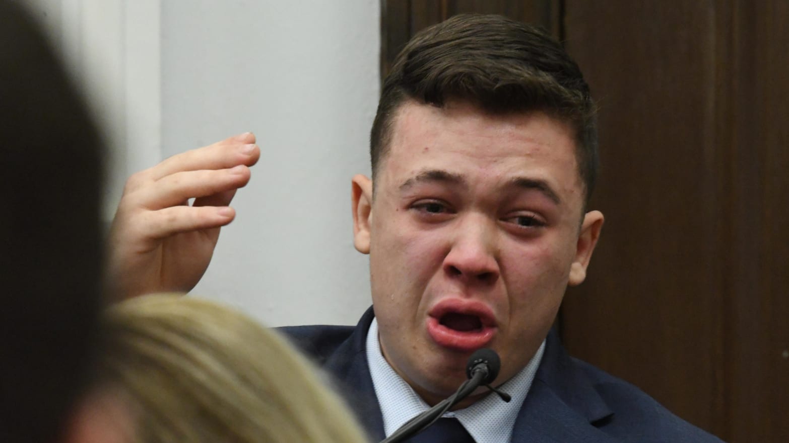 Kyle Rittenhouse becomes emotional describing events leading up to the shooting of Joseph Rosenbaum as he testifies during his trial at the Kenosha County Courthouse on November 10, 2021 in Kenosha, Wisconsin.