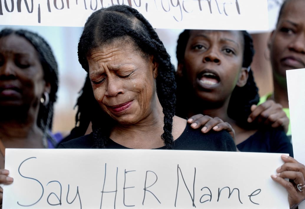 Donna Massey mourns the loss of her daughter, Sonya, who was shot and killed by Sangamon County Sheriff's Deputies July 6, during a protest over her daughter's death in front of the Sangamon County Building in Springfield, Illinois, U.S., July 12, 2024.