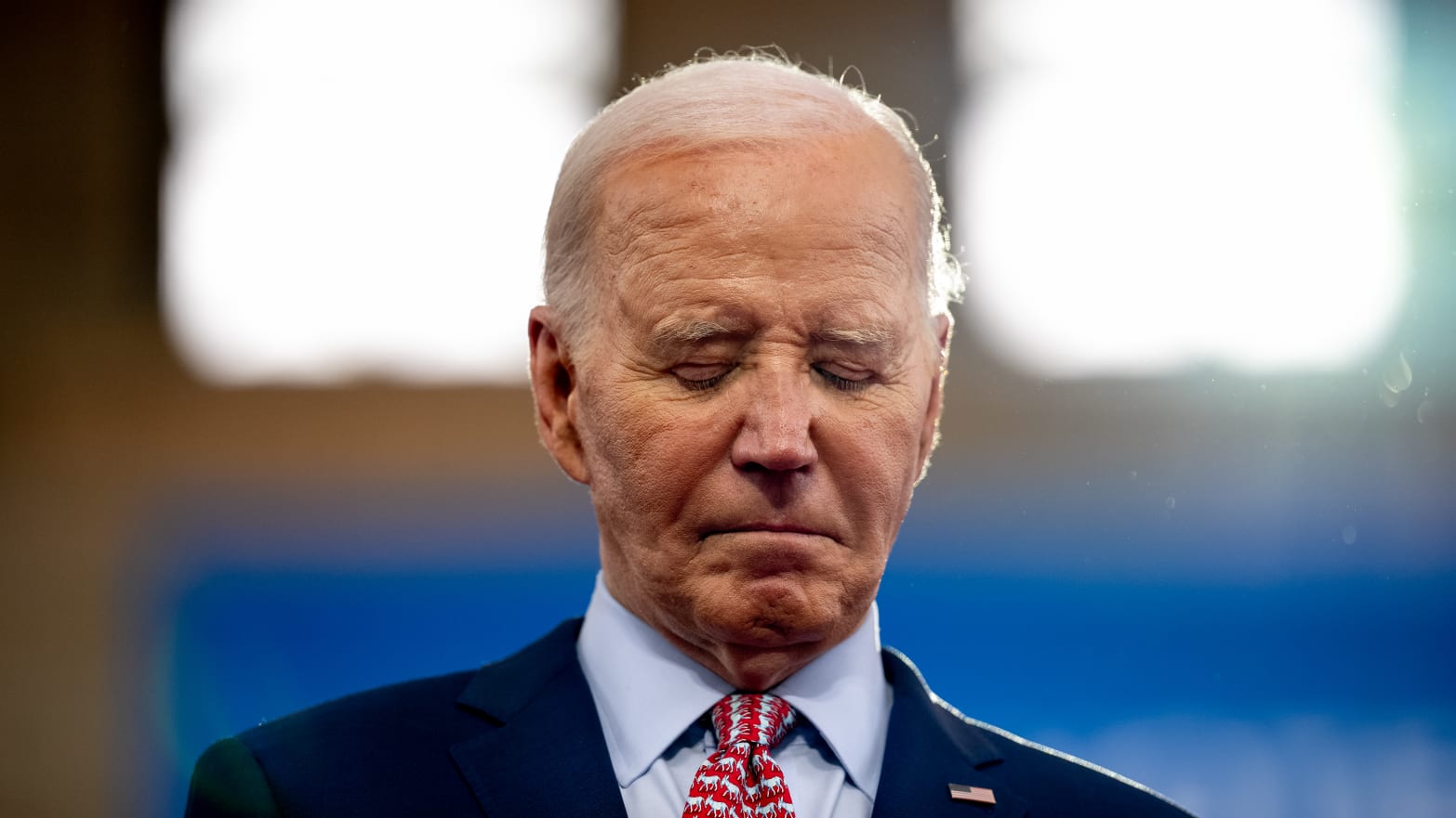 Joe Biden looking down in consternation
