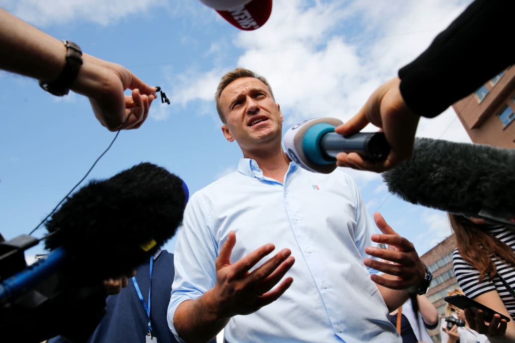 Photograph of Alexei Navalny speaking with journalists