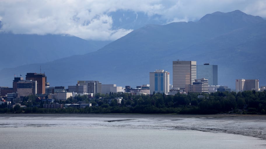 A view of the downtown skyline with mountains in the rear on July 10, 2022 in Anchorage, Alaska.