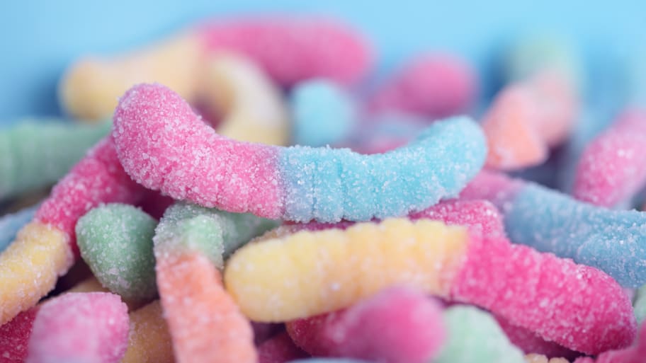 Close up of sweet and sour gummy worms.