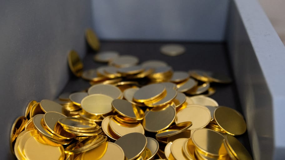Gold coins are seen in the factory of the Austrian Mint in Vienna, Austria.