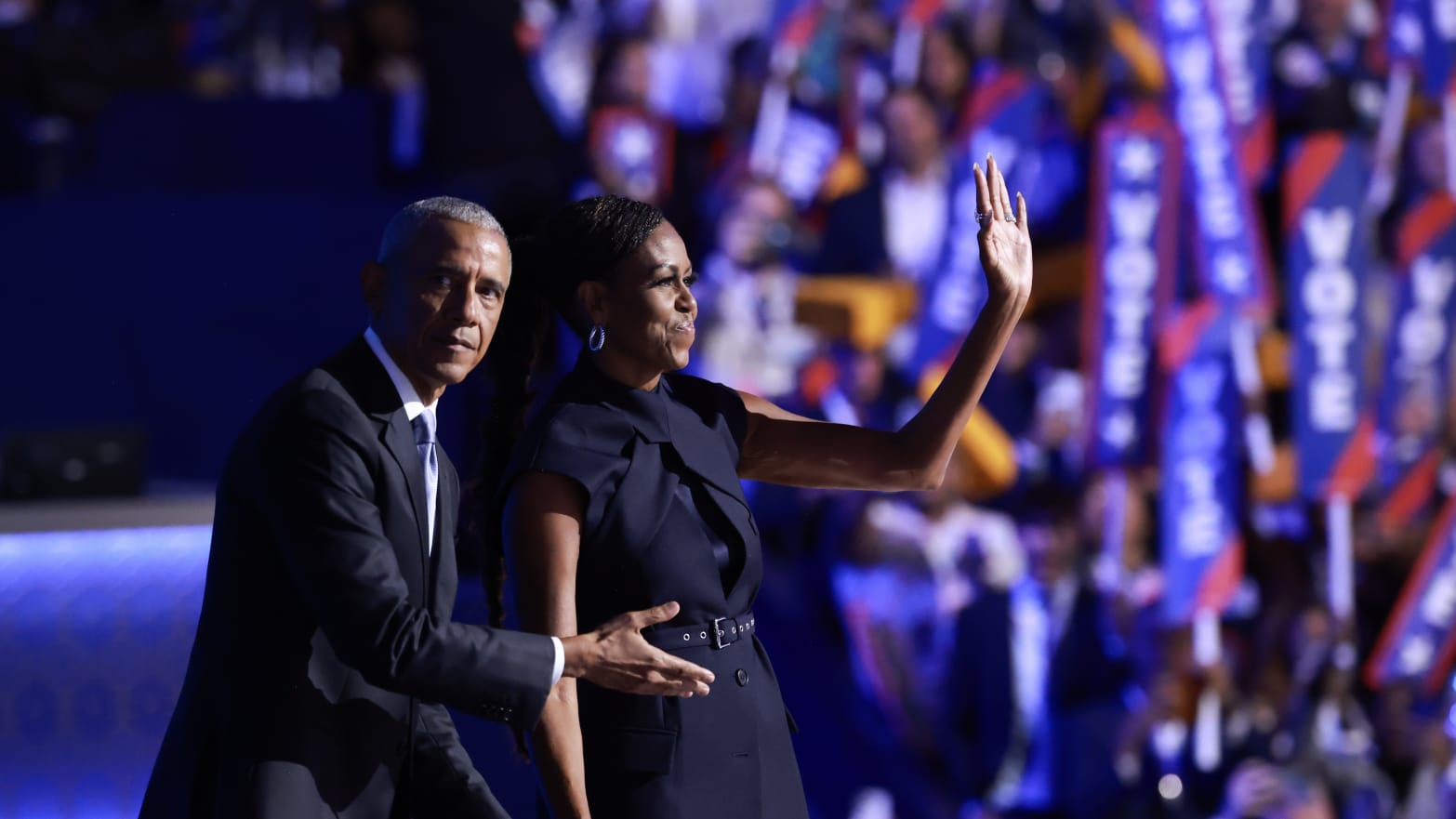 Barack and Michelle Obama join forces to attack Donald Trump at the DNC