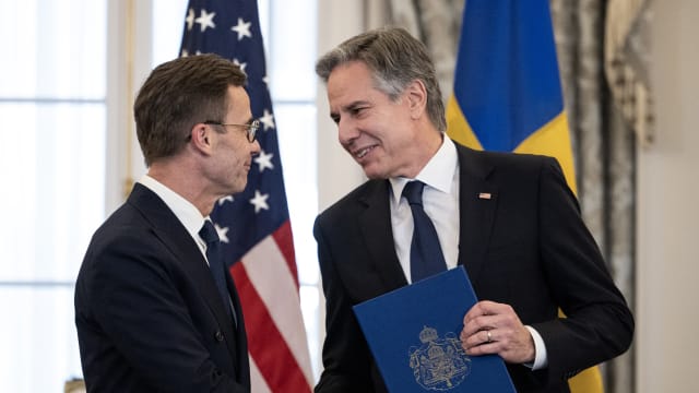 US Secretary of State Antony Blinken receives the NATO ratification documents from Swedish Prime Minister Ulf Kristersson