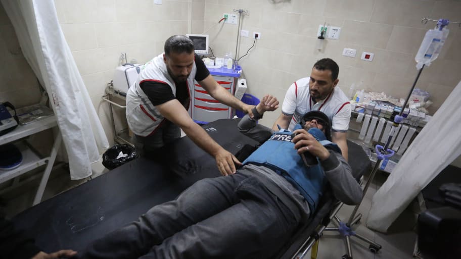 Injured journalists from TRT Arabic channeI are brought to Avde hospital for medical treatment after an Israeli attack at the Nuseirat Refugee Camp in Deir Al Balah, Gaza on April 12, 2024. 