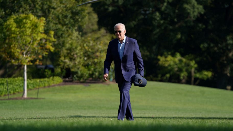 President Joe Biden walks across the South Lawn after exiting Marine One.