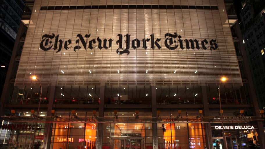 A photo of The New York Times building at night. 