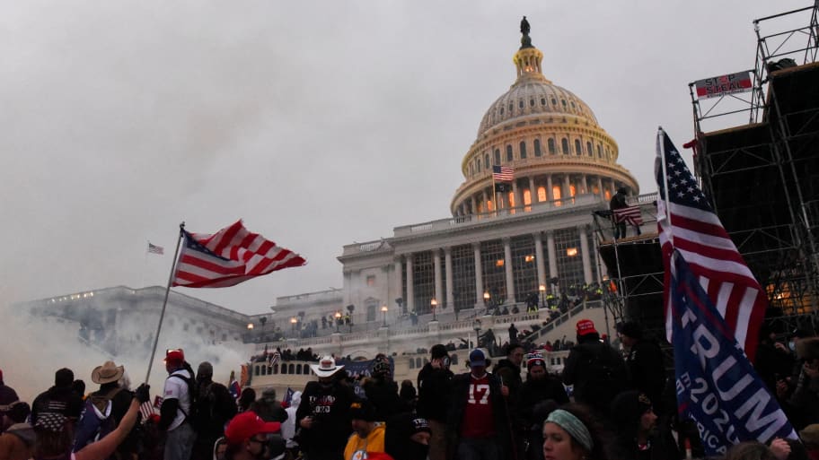 Supporters of U.S. President Donald Trump riot outside the U.S. Capitol Building.