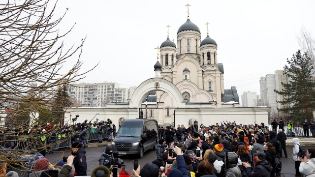 A hearse, which reportedly transports a coffin with the body of Russian opposition politician Alexei Navalny, is parked outside the Soothe My Sorrows church before a funeral service and farewell ceremony in Moscow, Russia, March 1, 2024. 