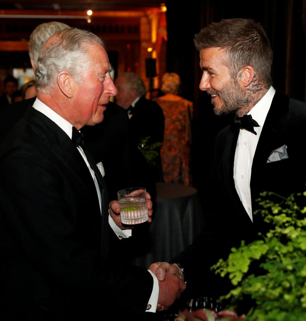 Britain's Prince Charles talks with David Beckham during the global premiere of Netflix's "Our Planet" at the Natural History Museum in London, Britain April 4, 2019.