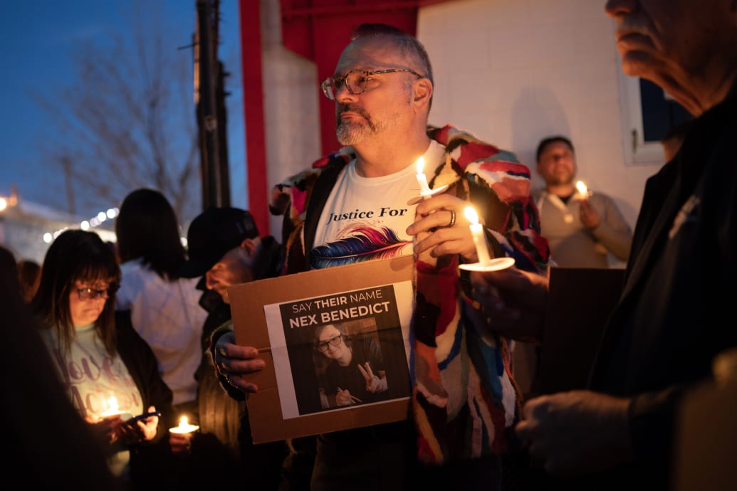 People attend a candlelight vigil for 16-year-old nonbinary student Nex Benedict in February in Oklahoma City, Oklahoma