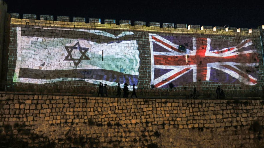 Israel and the U.K.'s respective flags.