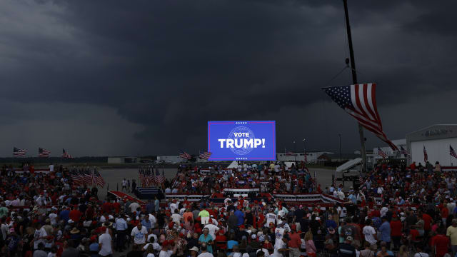 Storm clouds roll in as attendees await the start of a rally for former U.S. President Donald Trump at the Aero Center Wilmington on April 20, 2024 in Wilmington, North Carolina.
