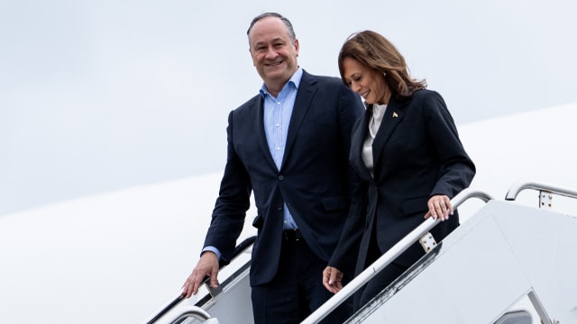 U.S. Vice President Kamala Harris and second gentleman Douglas Emhoff descend from Air Force Two at Delaware National Air Guard base in New Castle, Delaware, on July 22, 2024. 
