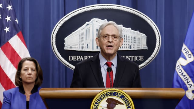 U.S. Attorney General Merrick Garland speaks alongside Deputy Attorney General Lisa Monaco during a news conference at the Department of Justice Building on March 21, 2024 in Washington, DC