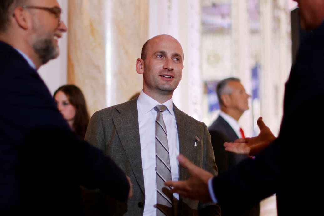 Trump administration senior adviser Stephen Miller speaks with fellow supporters as they gather in the ballroom at former U.S. President Donald Trump's Mar-a-Lago estate.