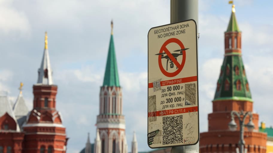 A sign prohibiting unmanned aerial vehicles flying over the area is on display near the State Historical Museum and the Kremlin wall in central Moscow, Russia, May 3, 2023.
