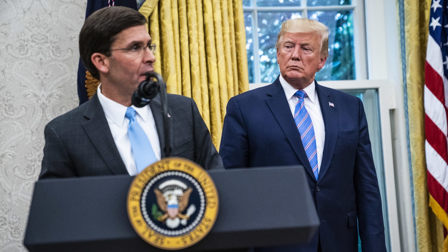 President Donald J. Trump watches as Mark Esper speaks after being sworn in as Secretary of Defense by Associate Justice of the Supreme Court Samuel Alito in the Oval Office at the White House on Tuesday, July 23, 2019 in Washington, DC.