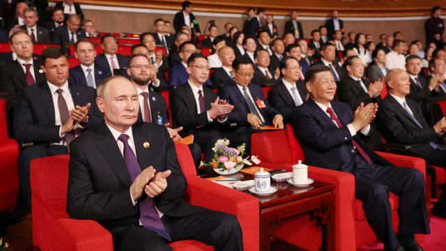 Russian President Vladimir Putin and Chinese President Xi Jinping watch the gala event celebrating the 75th anniversary of China-Russia relations, in Beijing, China May 16, 2024.