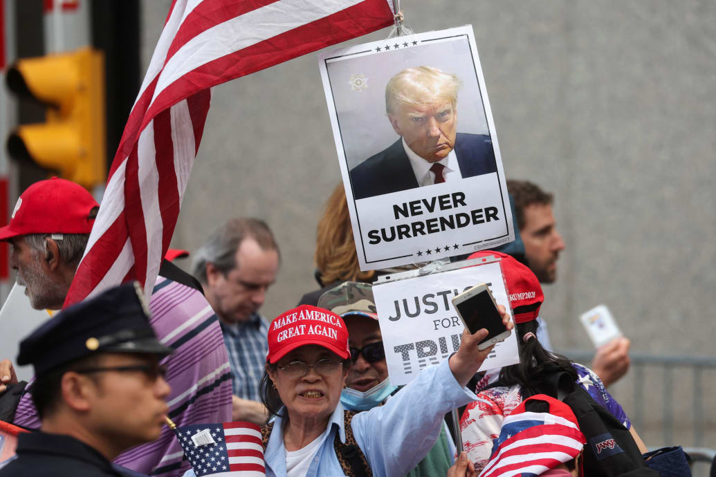 Supporters of former U.S. President Donald Trump demonstrate following the verdict in his criminal trial over charges that he falsified business records to conceal money paid to silence porn star Stormy Daniels in 2016, in NYC, U.S. May 30, 2024.