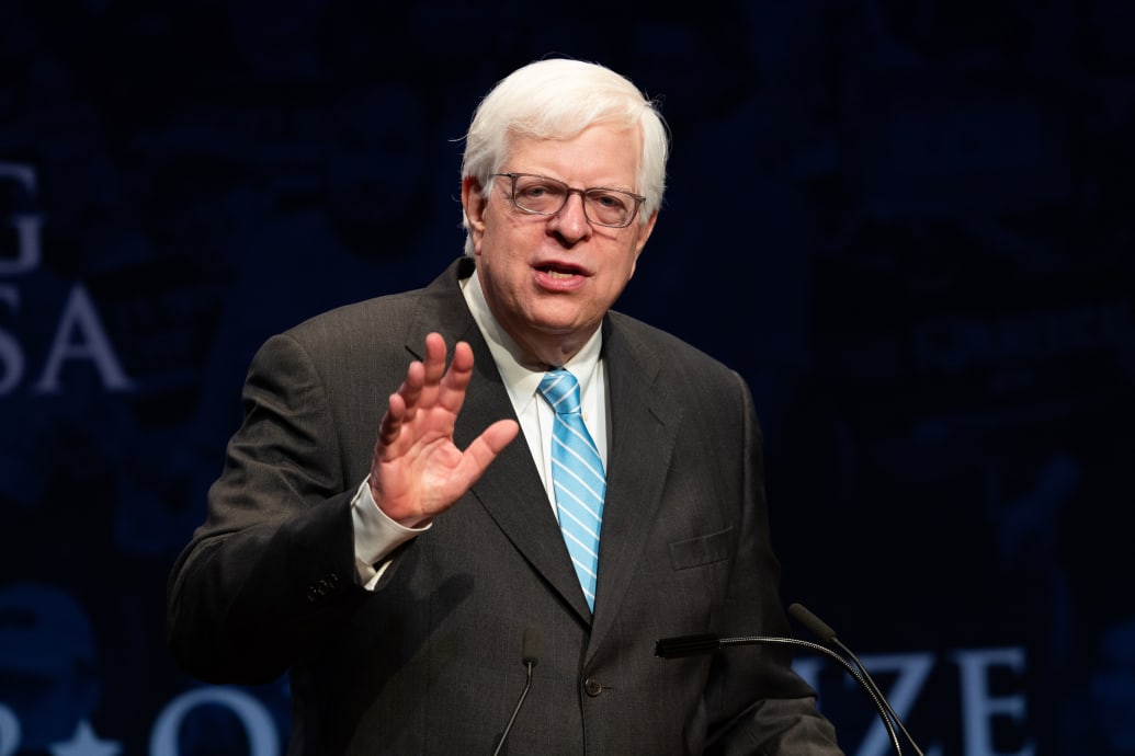 A photograph of Dennis Prager speaking at the Turning Point High School Leadership Summit