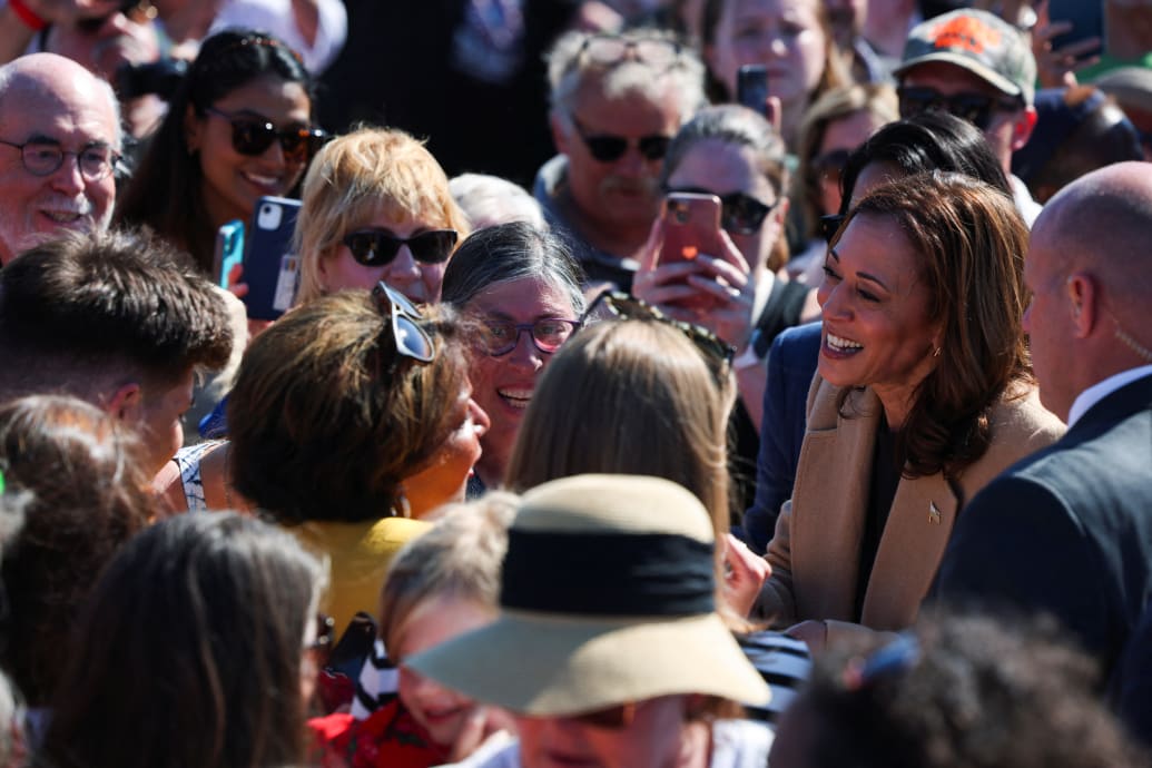 Democratic presidential nominee and U.S. Vice President Kamala Harris speaks with supporters.