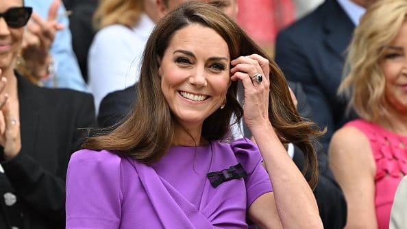 Catherine, Princess of Wales reacts as she arrives in the Royal Box on Centre Court to attend the men's singles final tennis match on the fourteenth day of the 2024 Wimbledon Championships.