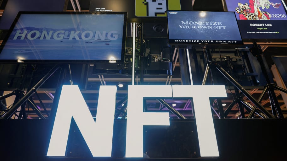 A signage for \"NFT\" is seen at Hong Kong Web3 Festival