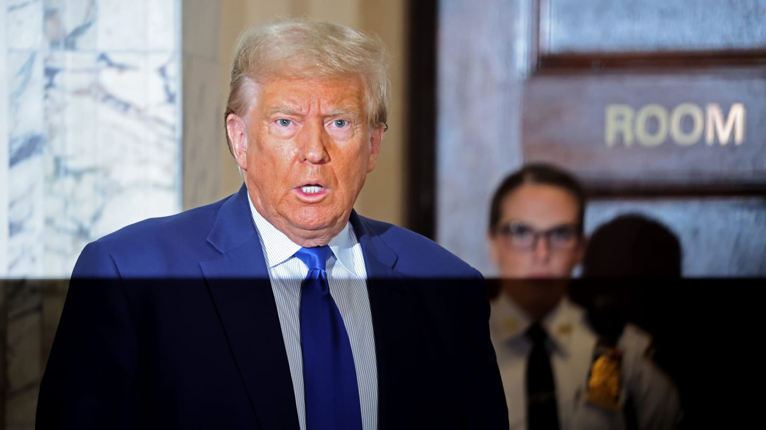 Former President Donald Trump speaks to the media at his civil fraud trial at New York State Supreme Court on October 25, 2023 in New York City