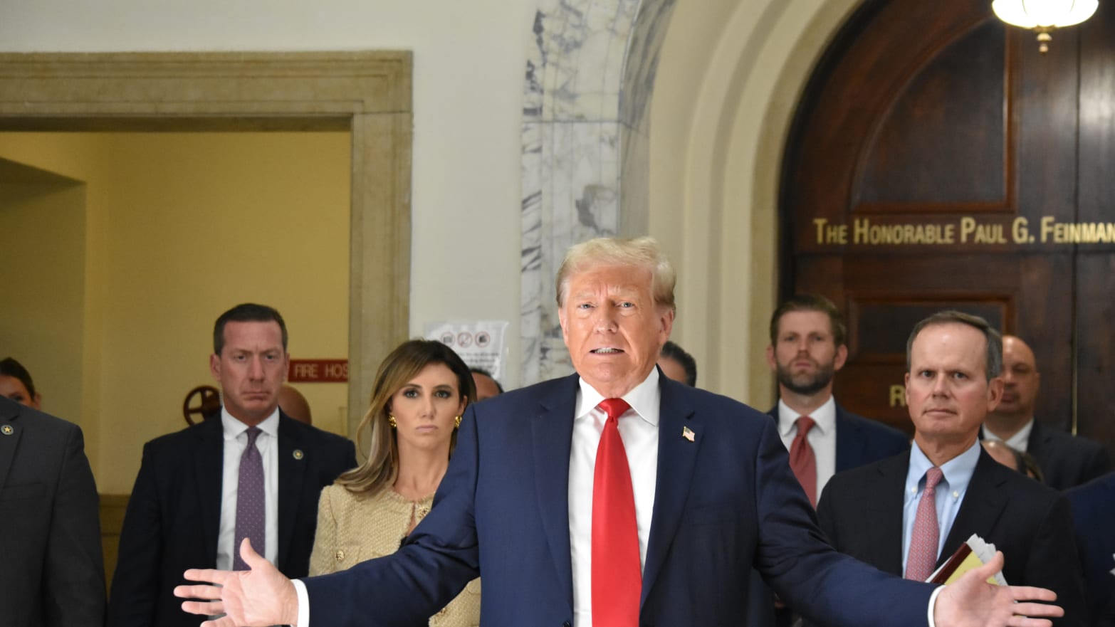 Former President of the United States Donald J. Trump appears in the hallway of the courthouse