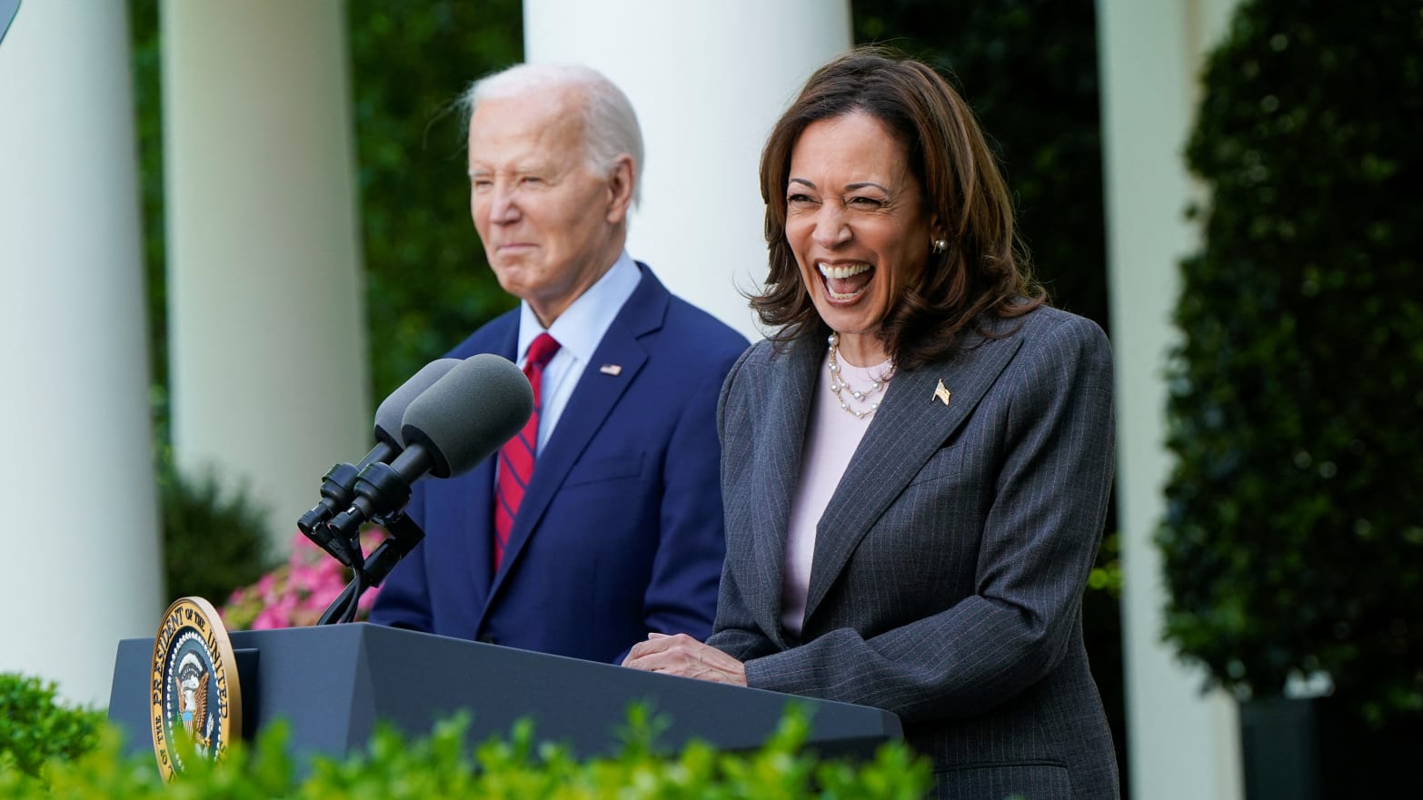 U.S. Vice President Kamala Harris delivers remarks, as President Joe Biden listens