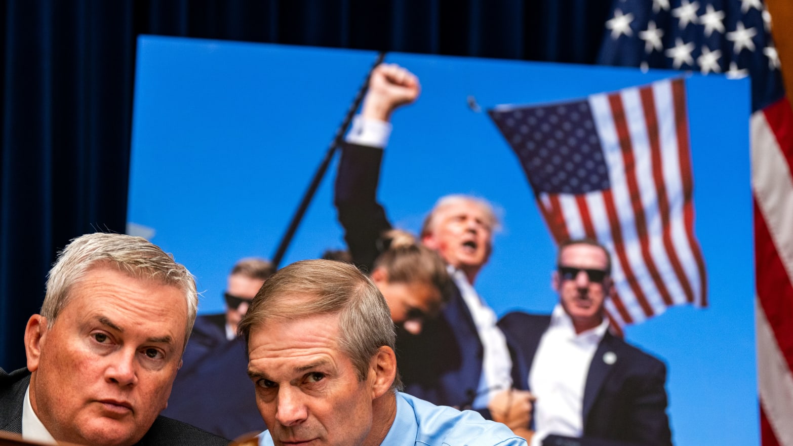 Rep. James Comer (R-KY) and Rep. Jim Jordan (R-OH) chat with each other as United States Secret Service Director Kimberly Cheatle testifies before the House Oversight and Accountability Committee.