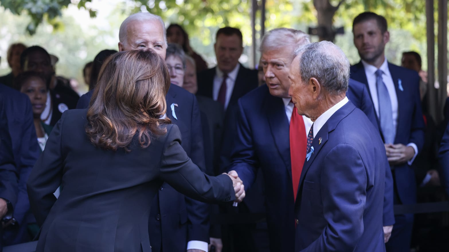 Donald Trump shaking hands with Kamala Harris at a 9/11 memorial event in Manhattan the morning after their presidential debate.