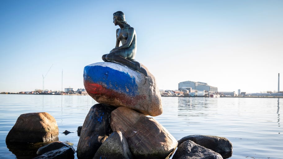 Denmark’s Little Mermaid sculpture defaced with the colors of the Russian flag.