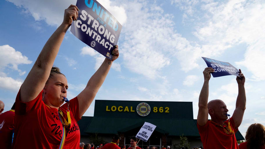 People attend a UAW rally to support striking workers outside an assembly plant in Louisville, Kentucky, on Sept. 21, 2023.