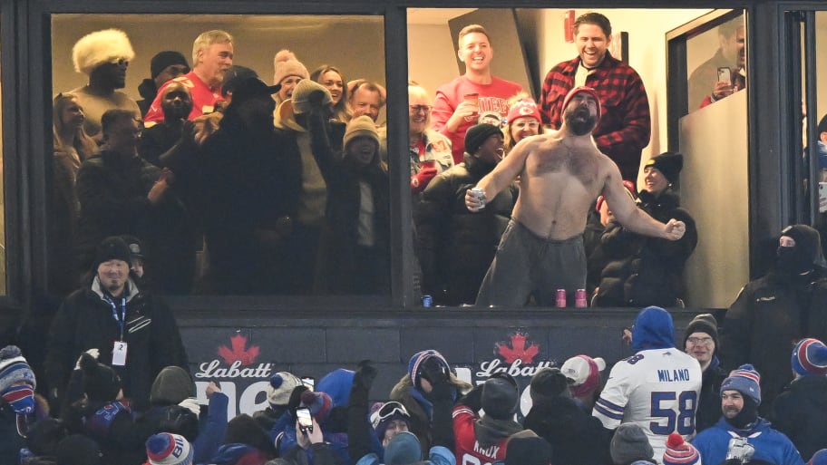 Jason Kelce of the Philadelphia Eagles celebrates shirtless after the Kansas City Chiefs score a touchdown against the Buffalo Bills.