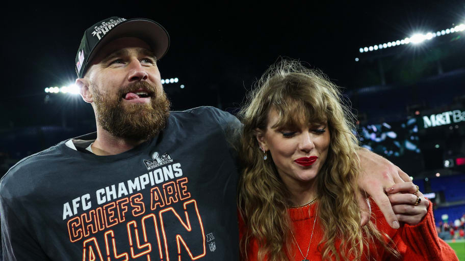 Travis Kelce #87 of the Kansas City Chiefs (L) celebrates with Taylor Swift after defeating the Baltimore Ravens