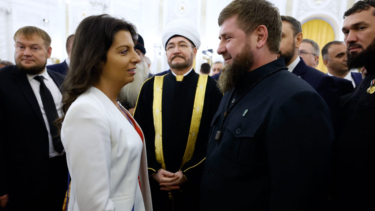 Chechnya's leader Ramzan Kadyrov (center R) talks to Margarita Simonyan,