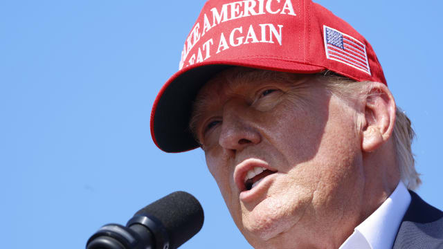 Donald Trump wearing a MAGA hat