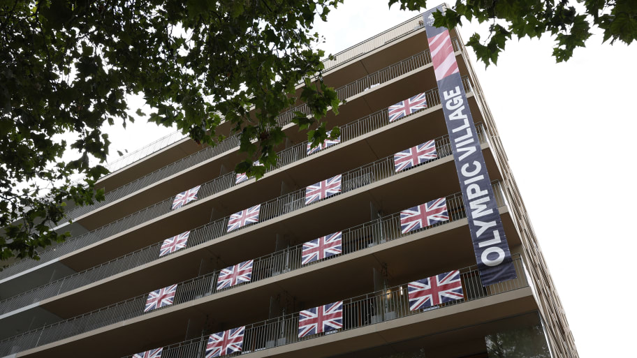 Union Jack flags hanging on a building are pictured at the Olympic village, ahead of the Paris 2024 Olympics.