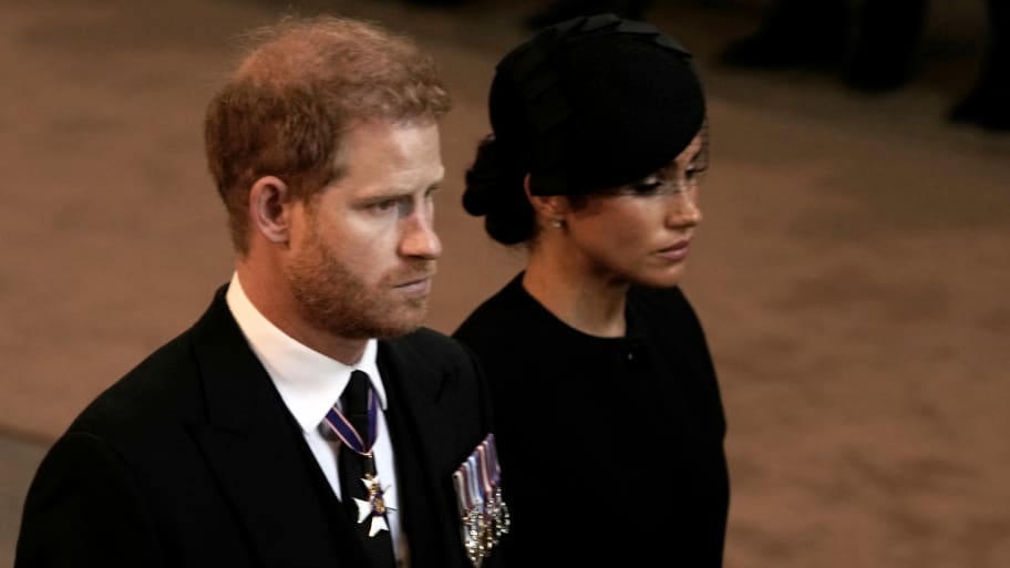 Prince Harry and Meghan, Duchess of Sussex, leave Westminster Hall in London, Wednesday, Sept. 14, 2022.