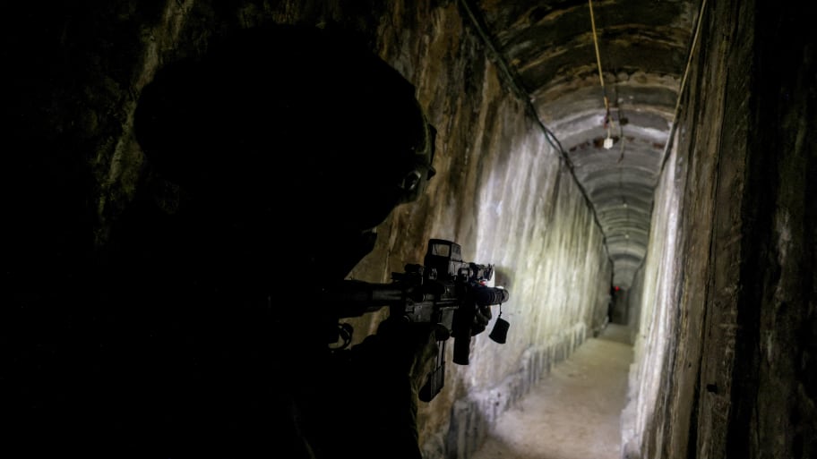 An Israeli soldier secures a Hamas tunnel underneath Al Shifa Hospital in Gaza City