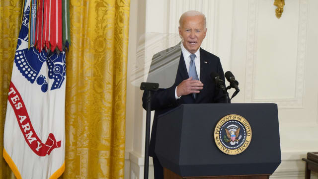 Joe Biden at the White House reading from a teleprompter
