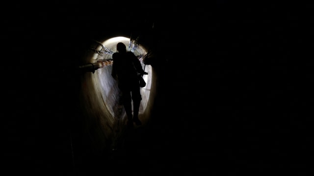 An image of an underground sewage tunnel in Paris.