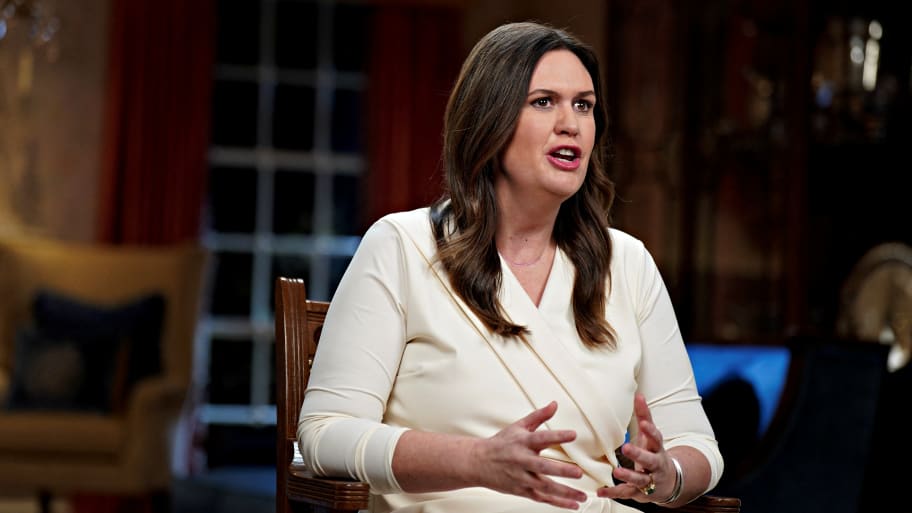 Sarah Huckabee Sanders sits while delivering the Republican response to Joe Biden’s 2023 State of the Union address.